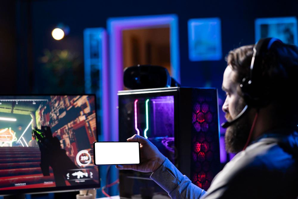 A man immersed in a video game on his computer, using VSEE V3 Pro and Superbox Ultra Elite for high-quality streaming.